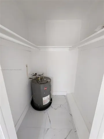 a view of a storage and utility room