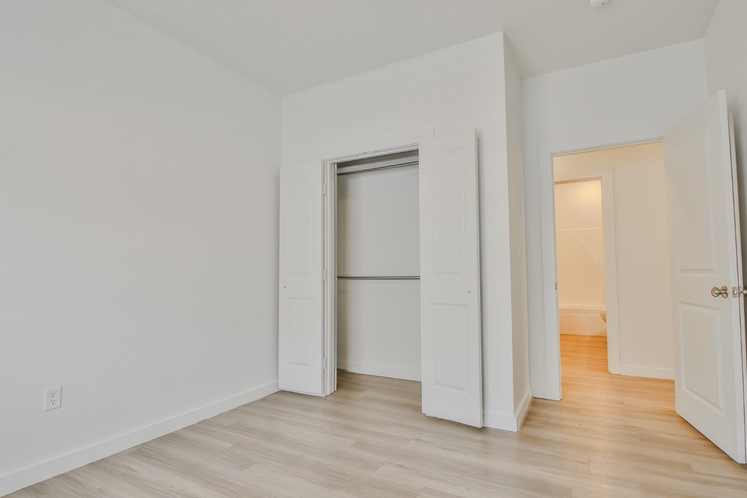5508 Itasca Street Lubbock, TX 79416 - Photo 14 of 25 a view of an empty room with wooden floor