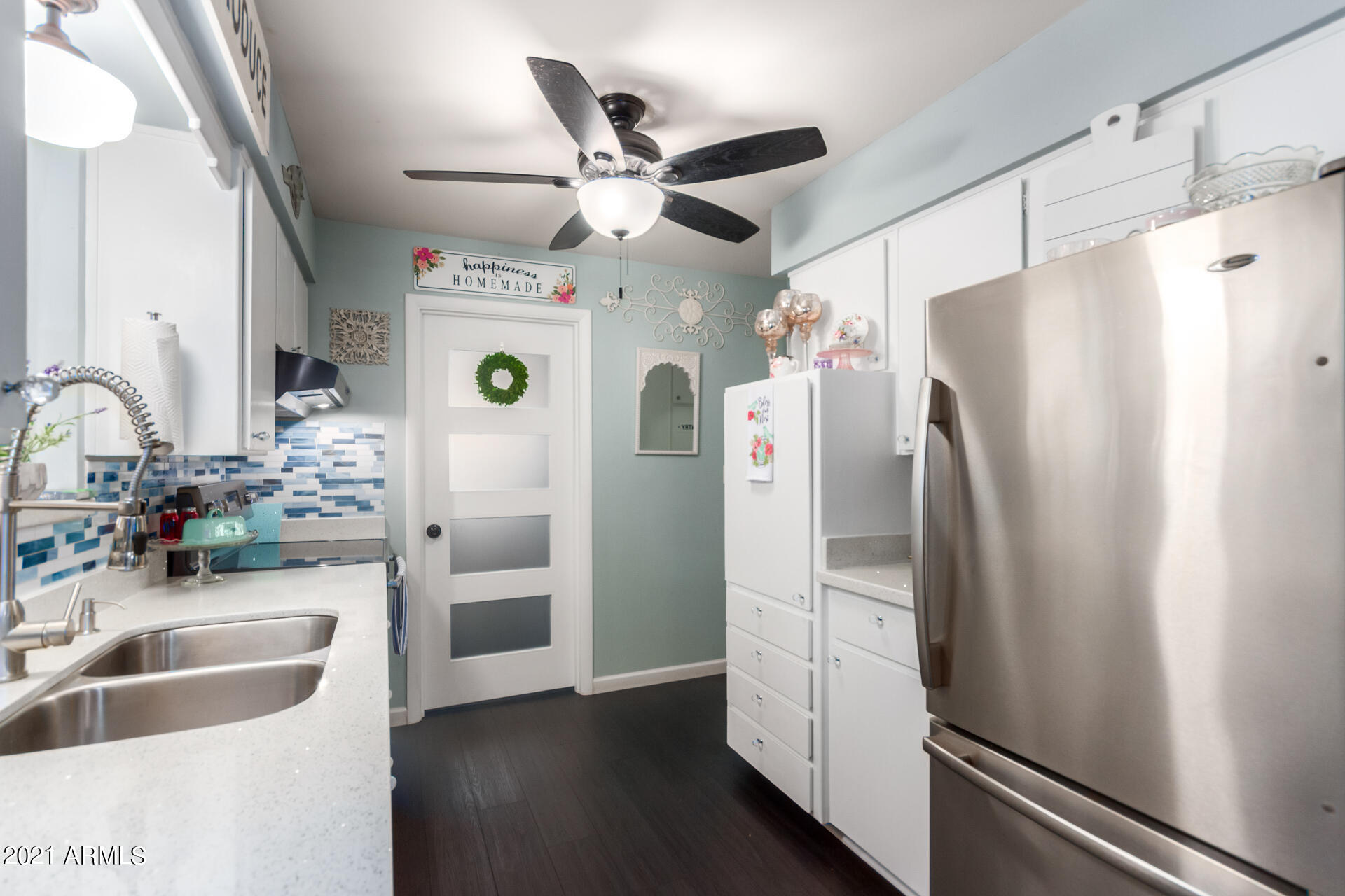5209 Covina Road Mesa, AZ 85205 - Photo 12 of 39 Ceiling fans even in the kitchen
