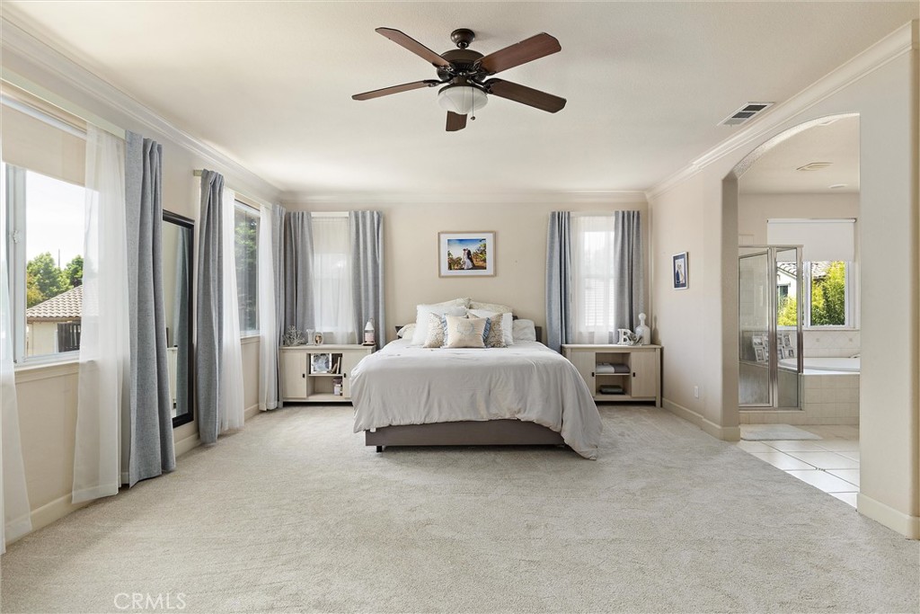 204 Vista Del Rio Court Paso Robles, CA 93446 - Photo 17 of 43 Have you ever dreamt of an enormous primary bedroom, bathroom, and closet? This is the dream!