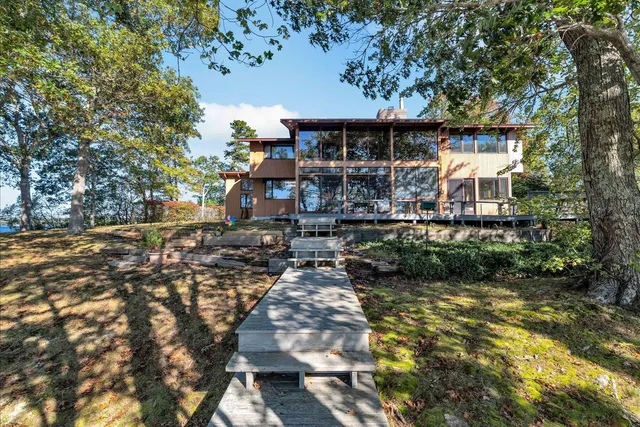 a view of a yard with wooden floor