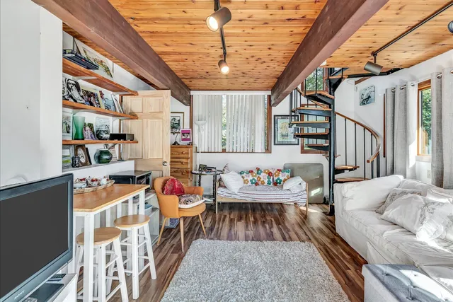 a bed room with a bed and a table