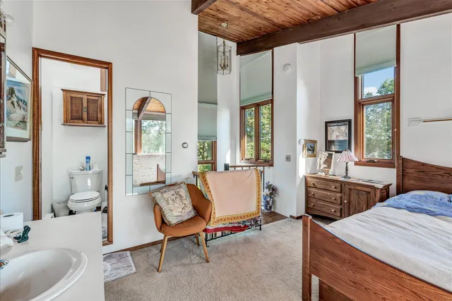 a bathroom with a sink a vanity and a mirror