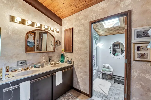 an aerial view of valley and lake