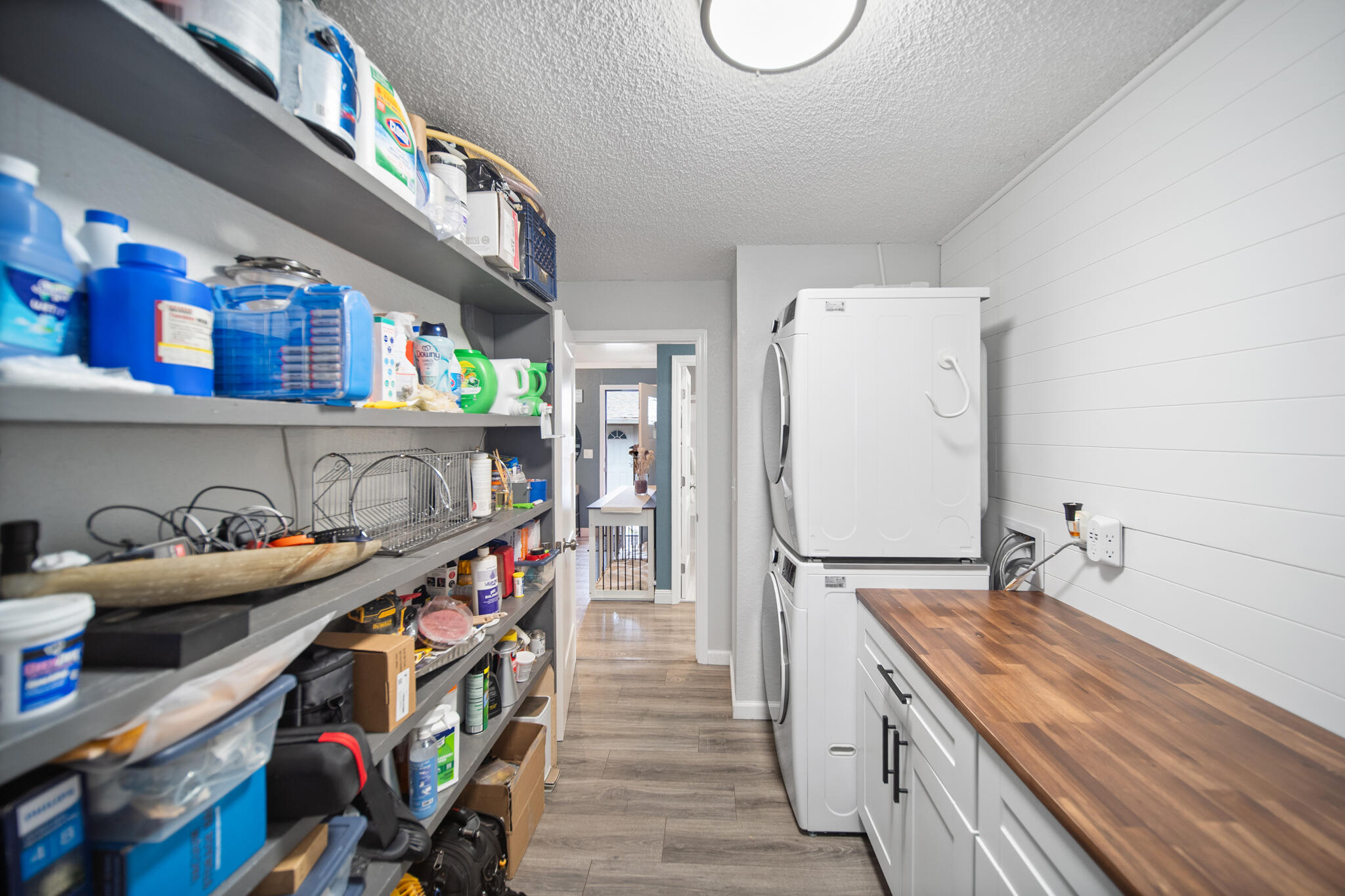 3922 Laredo Street Shasta Lake, CA 96019 - Photo 21 of 35 a hallway with washer and dryer