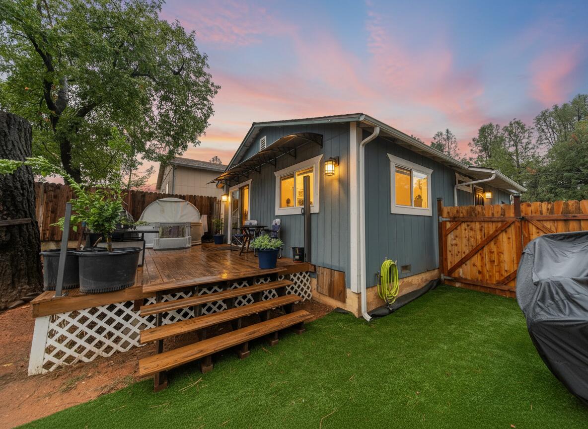 3922 Laredo Street Shasta Lake, CA 96019 - Photo 22 of 35 a front view of a house with garden