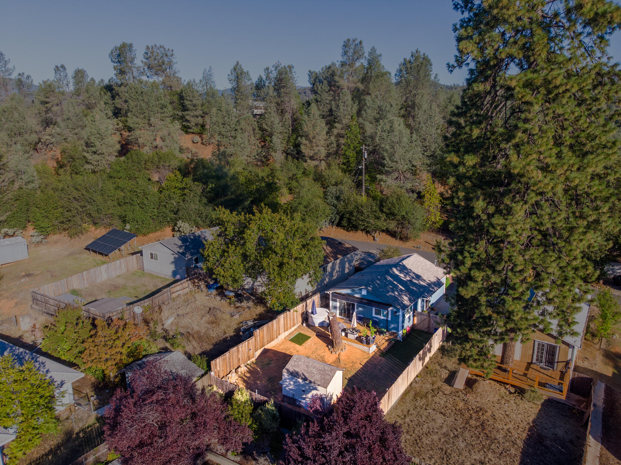 3922 Laredo Street Shasta Lake, CA 96019 - Photo 32 of 35 an aerial view of a house with a yard