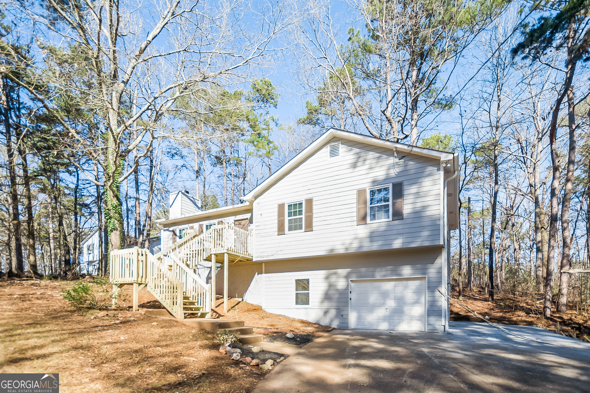 302 West Paulding Boulevard Dallas, GA 30157 - Photo 2 of 15 a view of a house with snow on the road