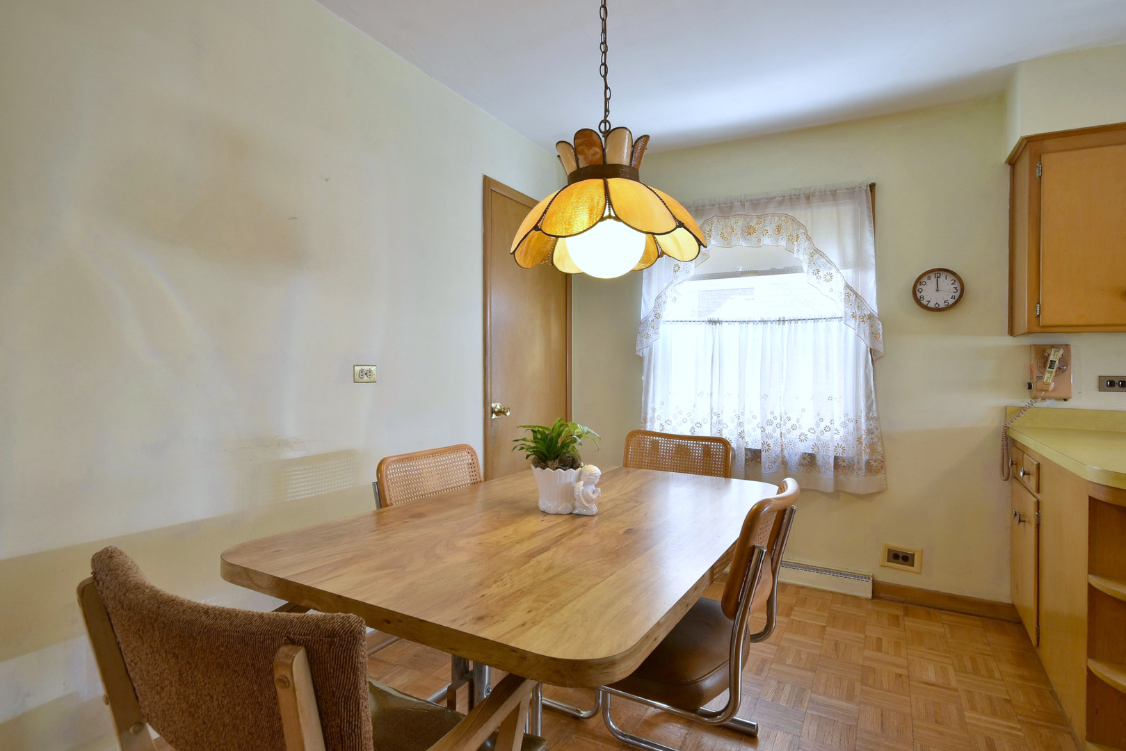 7555 Monroe Street Niles, IL 60714 - Photo 16 of 41 a view of a dining room with a table and chairs