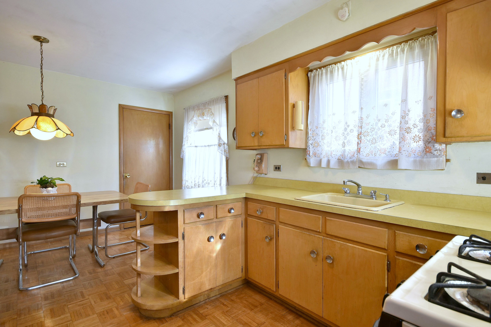 7555 Monroe Street Niles, IL 60714 - Photo 21 of 41 a kitchen with a sink and cabinets