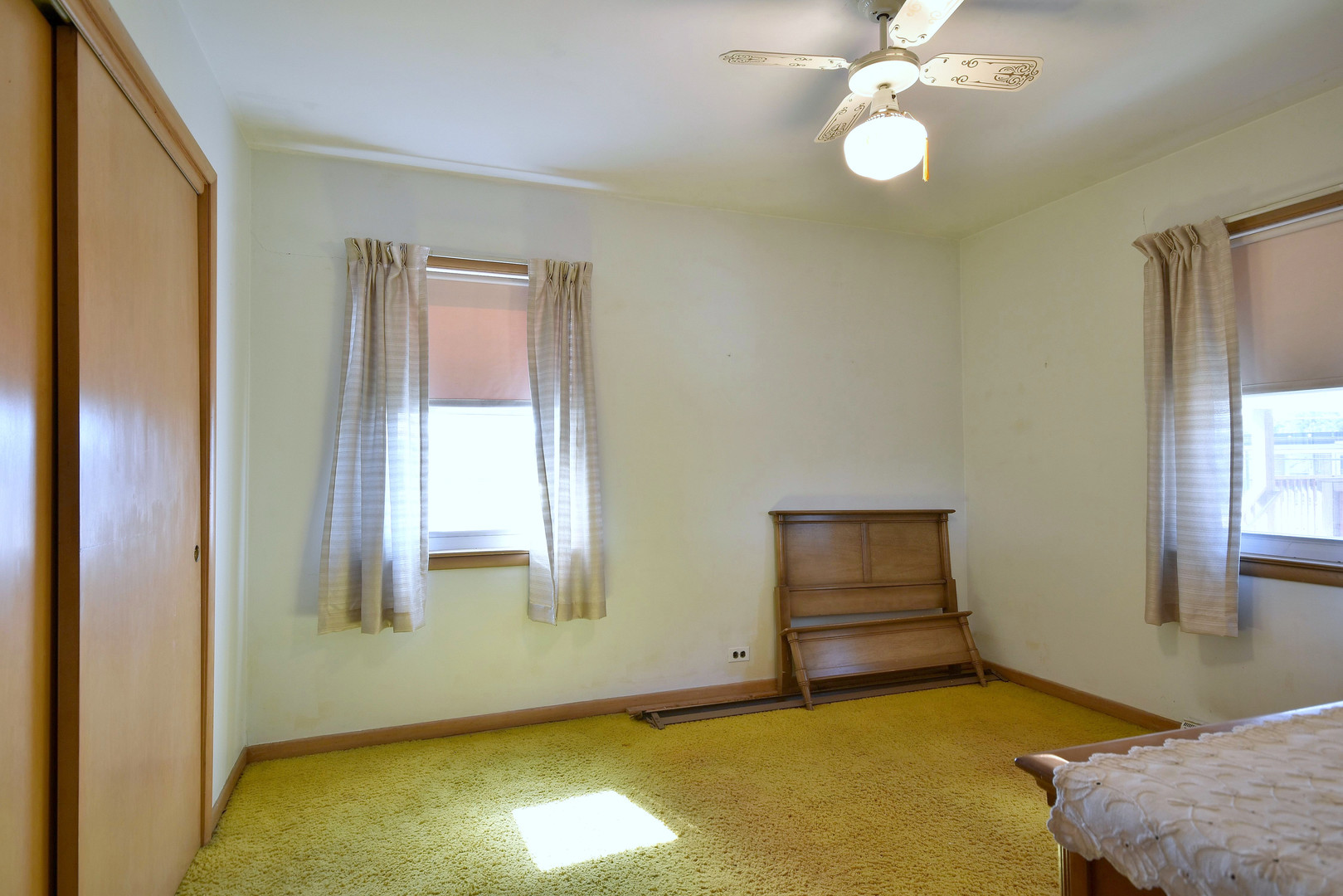 7555 Monroe Street Niles, IL 60714 - Photo 24 of 41 a view of room with window and ceiling fan
