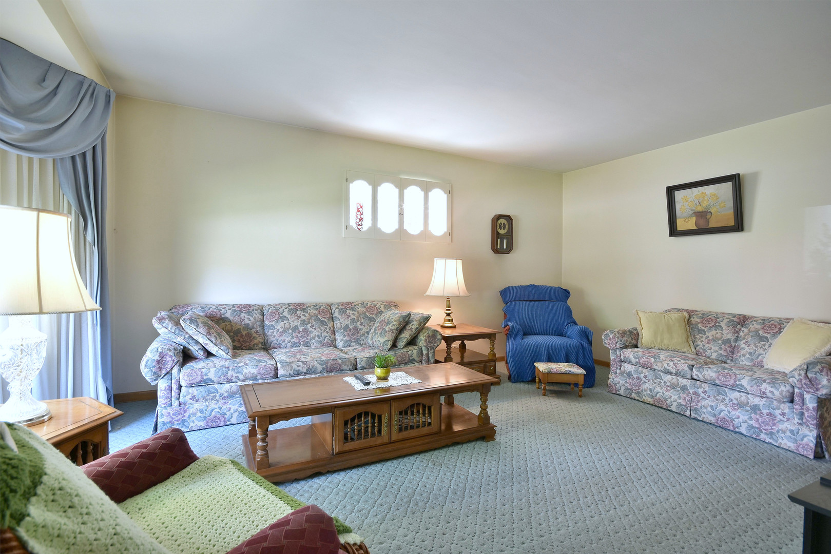 7555 Monroe Street Niles, IL 60714 - Photo 4 of 41 a living room with furniture and a window