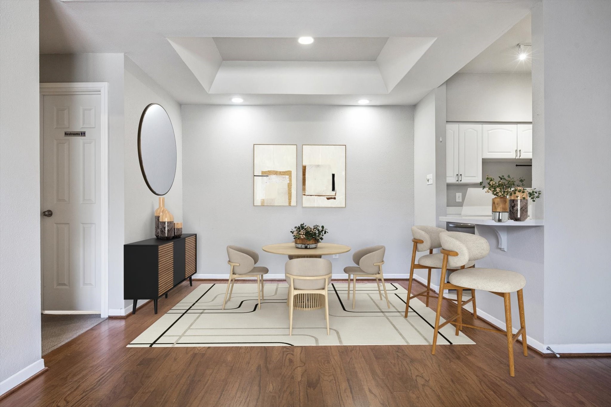 4041 Drake Street, Unit 113 Houston, TX 77005 - Photo 6 of 16 a living room with furniture a table and wooden floor