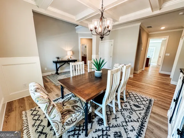 a view of a swimming pool with a yard