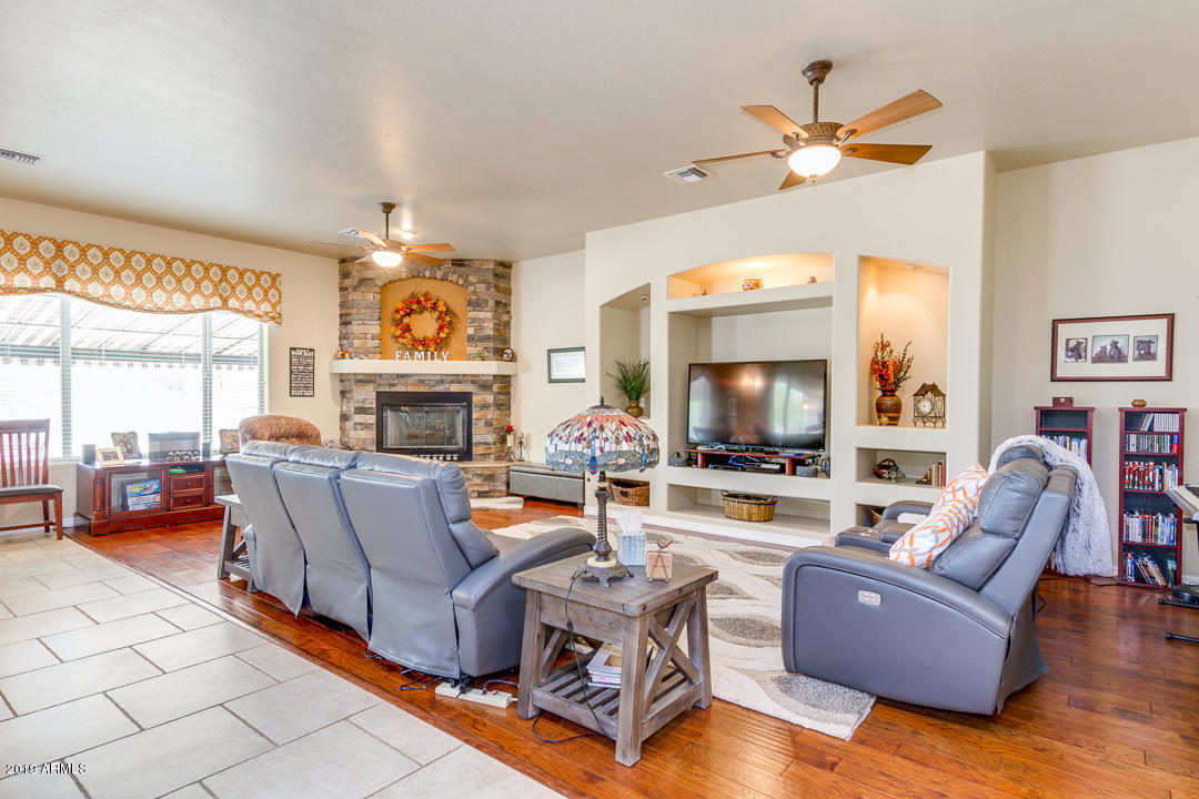 1126 West Joy Ranch Road Phoenix, AZ 85086 - Photo 14 of 45 Great Room with Fireplace