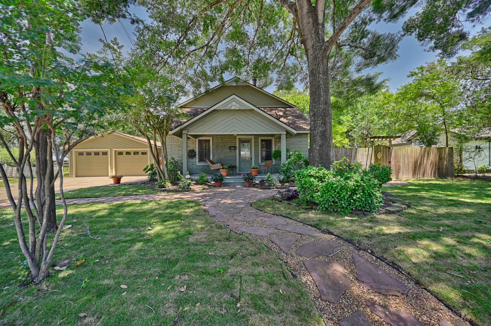 1026 Atchison Street Sealy, TX 77474 - Photo 1 of 50 a front view of a house with garden
