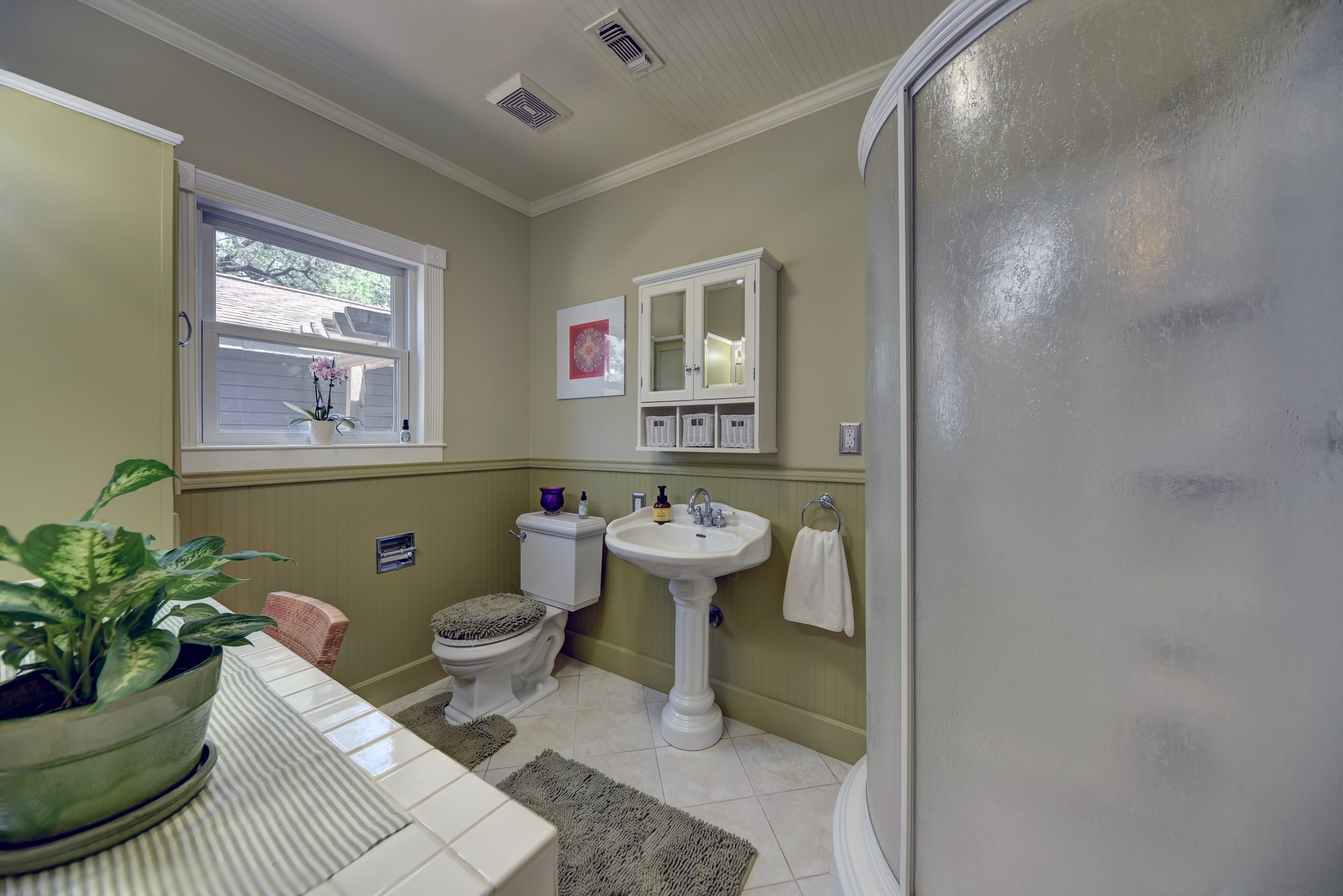 1026 Atchison Street Sealy, TX 77474 - Photo 19 of 50 a bathroom with a toilet sink and mirror