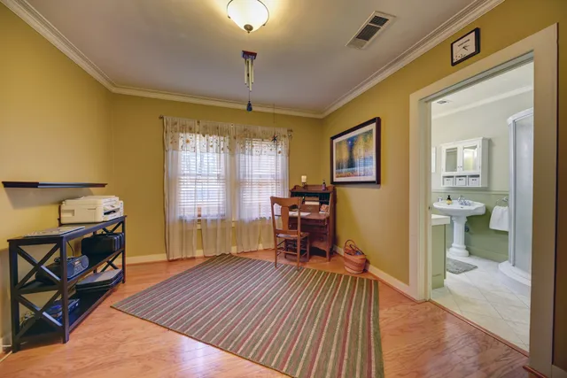 a view of a livingroom with furniture and a window