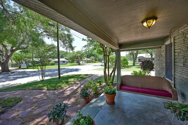 a view of a room with porch and garden