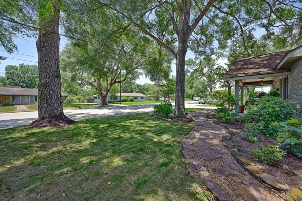 a view of outdoor space with deck and tree