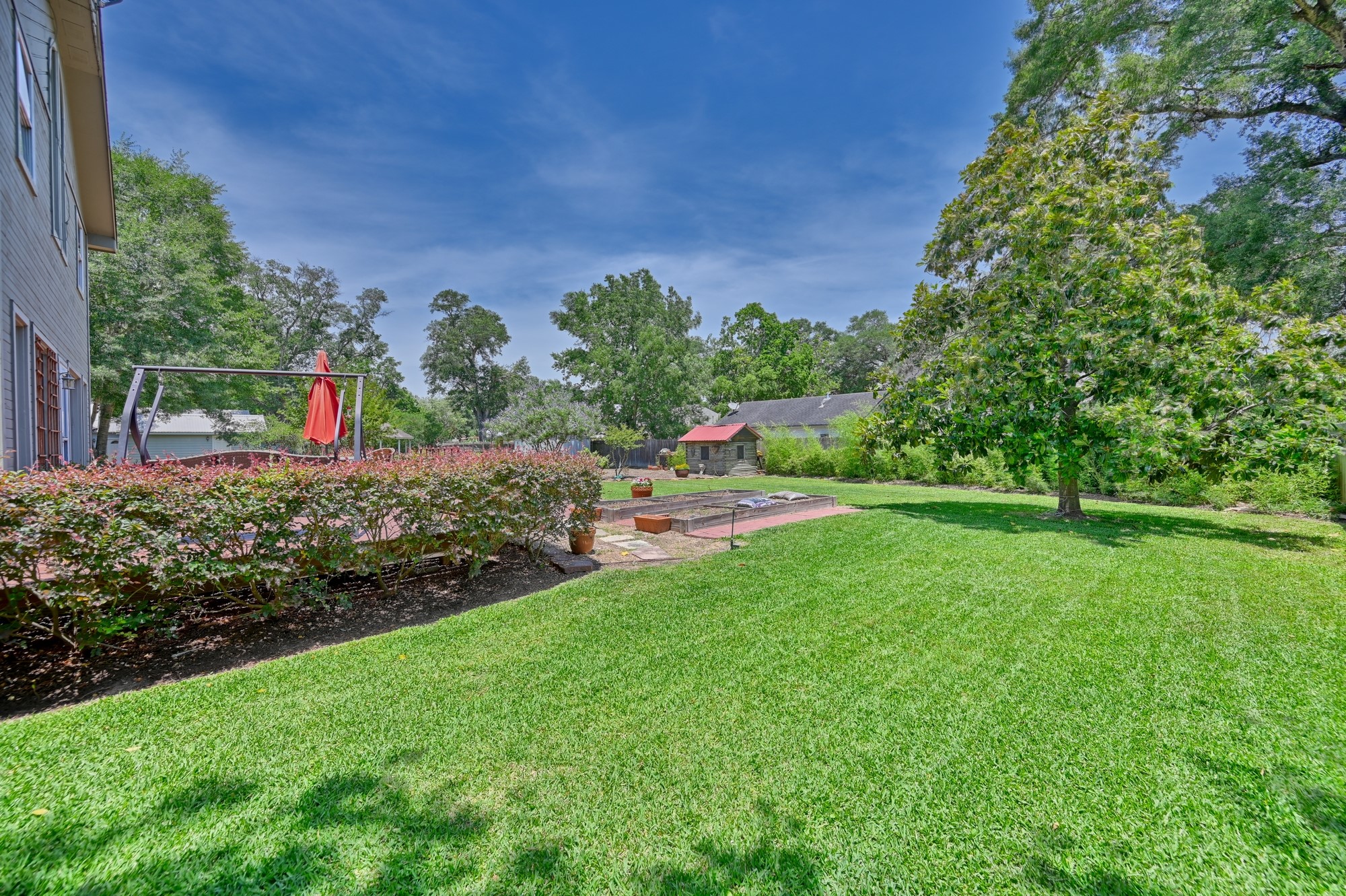 1026 Atchison Street Sealy, TX 77474 - Photo 6 of 50 a view of a garden with houses