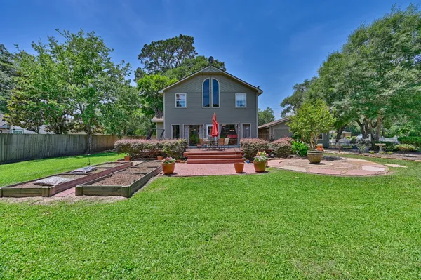 a house view with a garden space