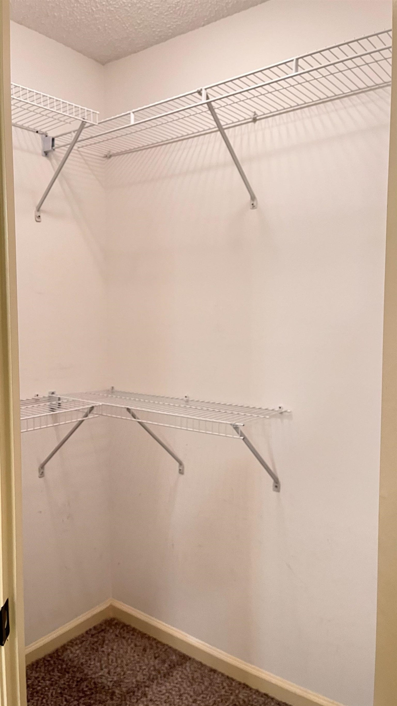 7770 Juniper Cove West Memphis, TN 38016 - Photo 27 of 34 a view of small space with racks on the wall