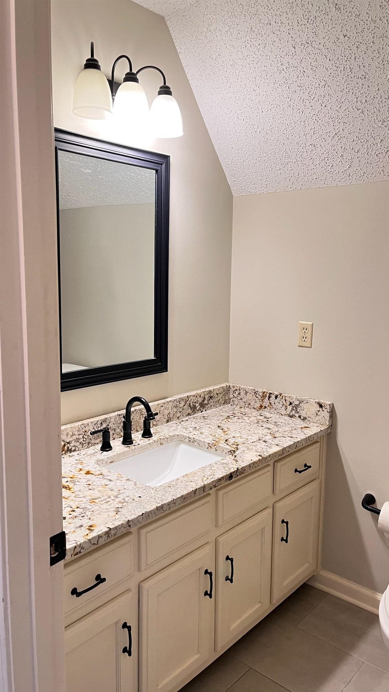 7770 Juniper Cove West Memphis, TN 38016 - Photo 31 of 34 a bathroom with a double vanity sink and a mirror