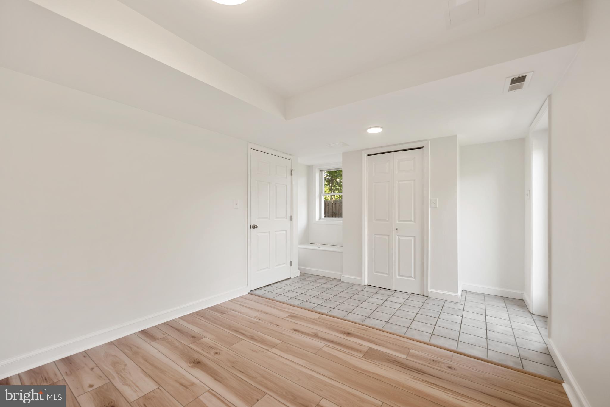 6800 Seton Court Springfield, VA 22152 - Photo 35 of 51 a view of an empty room with wooden floor