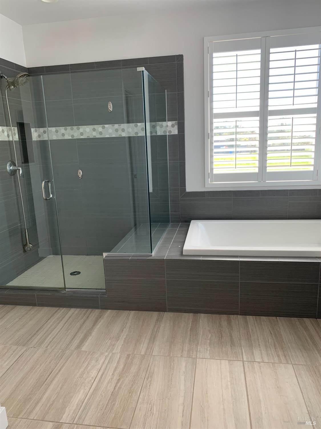 2522 Barley Lane Santa Rosa, CA 95403 - Photo 11 of 13 a bathroom with a bathtub and shower