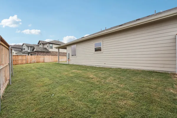 a view of a backyard with a garden
