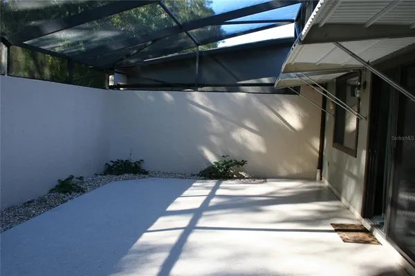 a kitchen with stainless steel appliances a refrigerator and a stove top oven