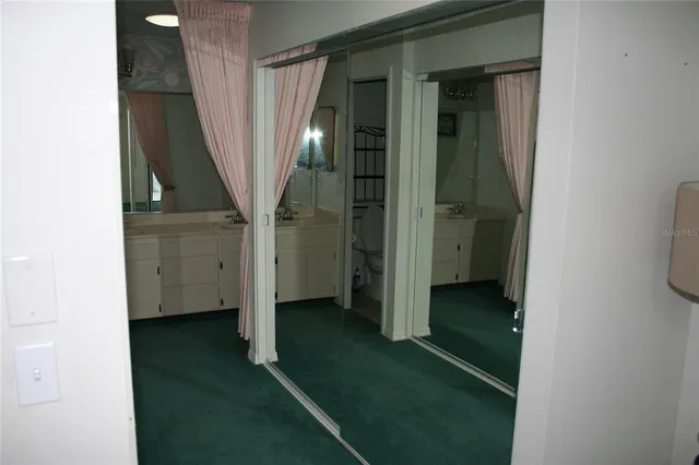 a view of entryway with a bathroom