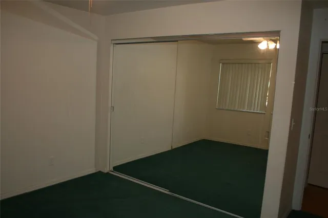an empty room with a door