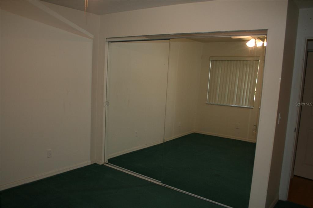3706 Northeast 16th Place Ocala, FL 34470 - Photo 6 of 14 an empty room with a door
