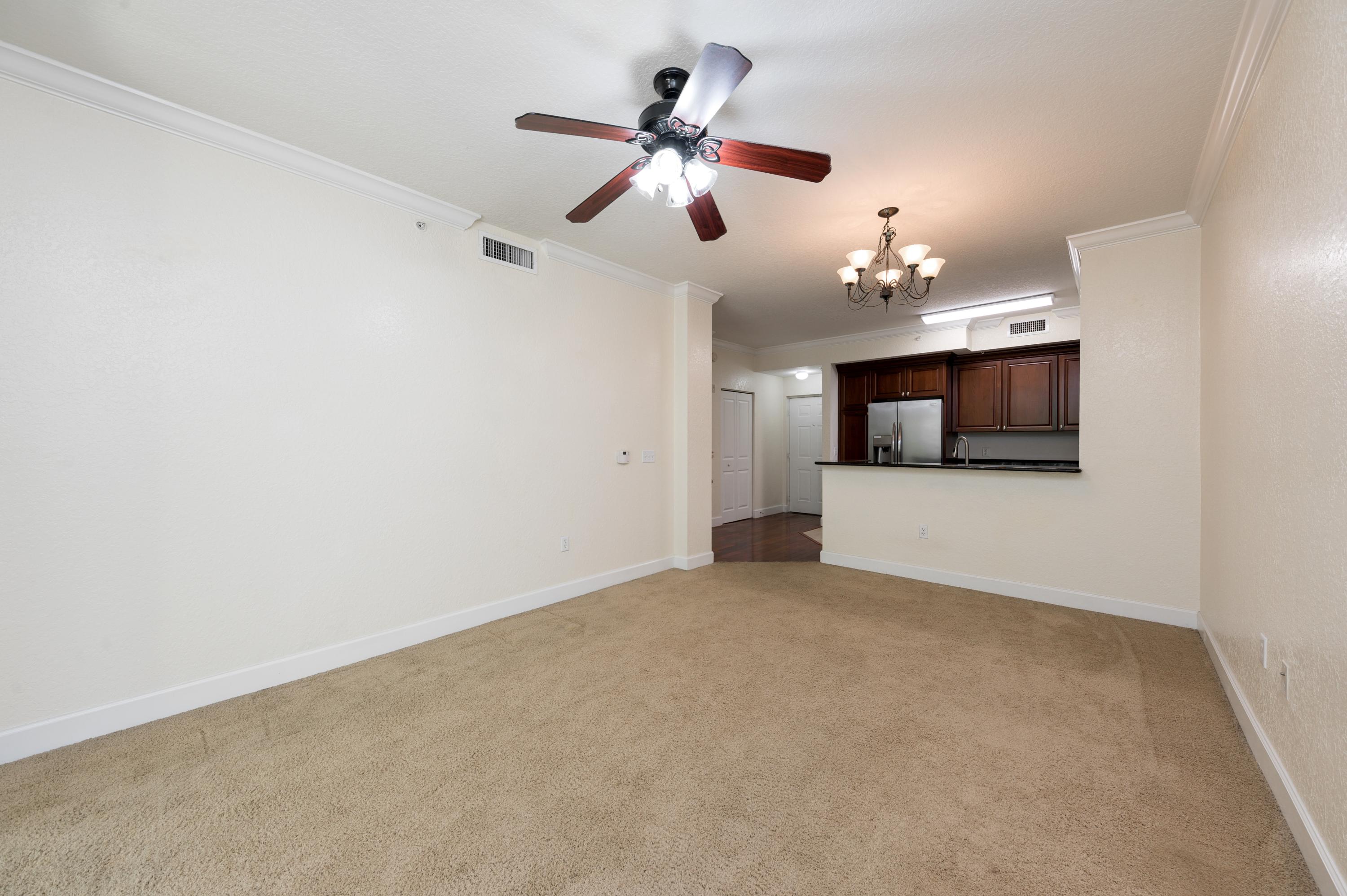 1116 Renaissance Way, Unit 116 Boynton Beach, FL 33426 - Photo 4 of 12 05_1116RenaissanceWay_93_LivingRoomDinin