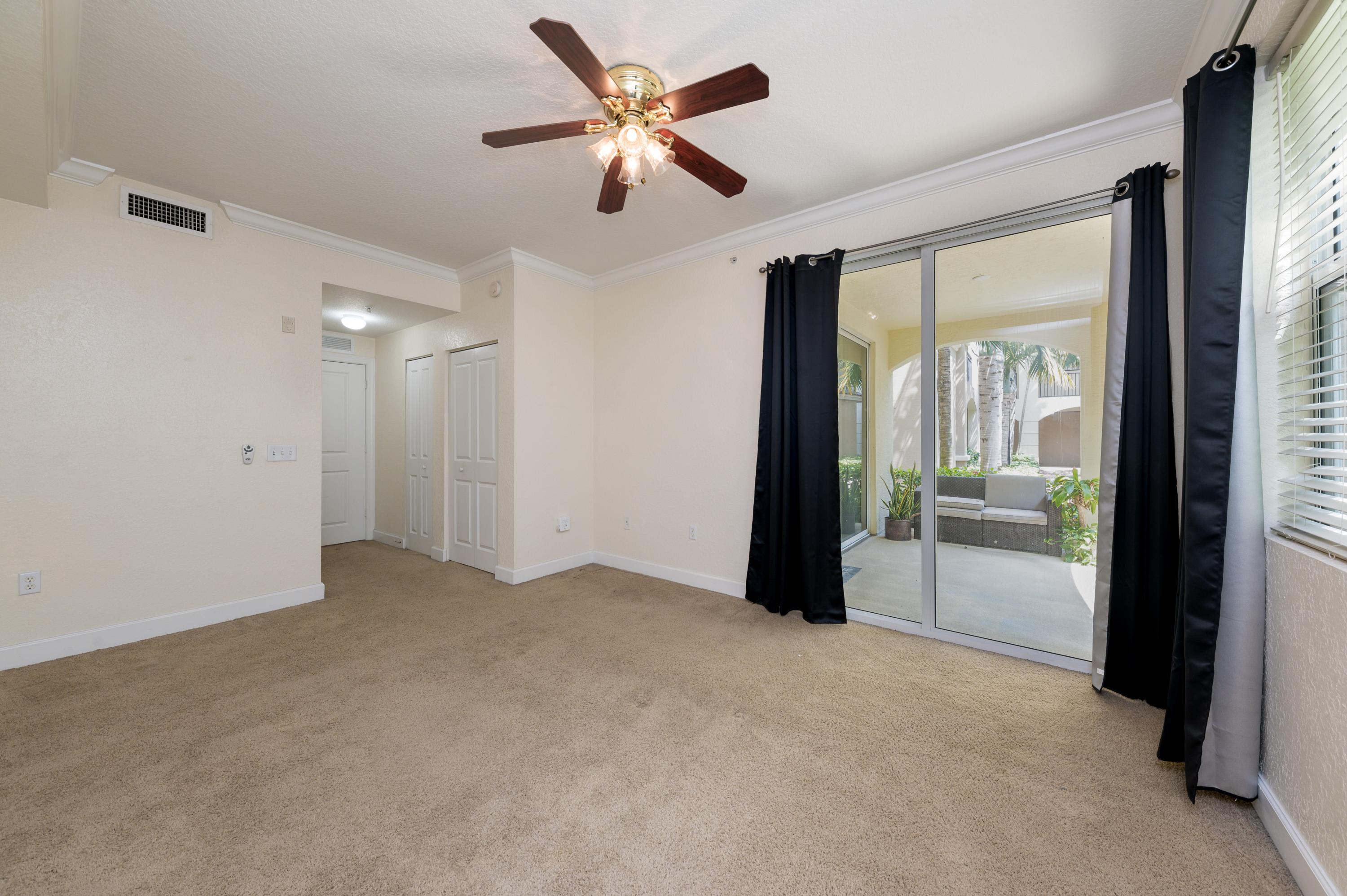 1116 Renaissance Way, Unit 116 Boynton Beach, FL 33426 - Photo 5 of 12 09_1116RenaissanceWay_18001_Bedroom_HiRe