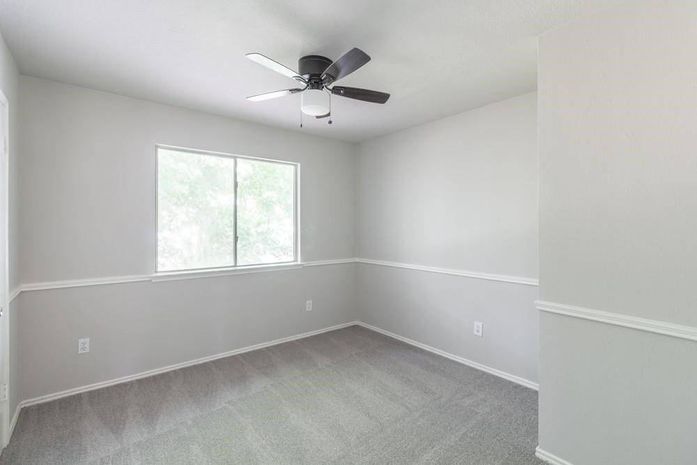 2007 Ruffian Lane Stafford, TX 77477 - Photo 12 of 17 an empty room with a window