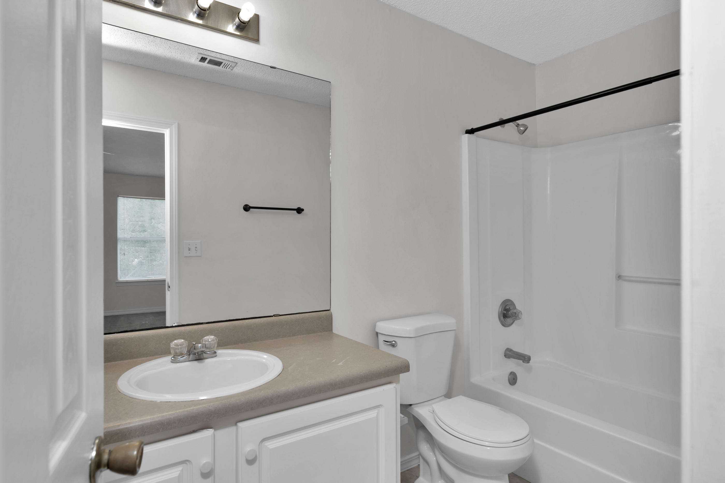508 Keystone Road Mary Esther, FL 32569 - Photo 13 of 15 a bathroom with a sink toilet and shower