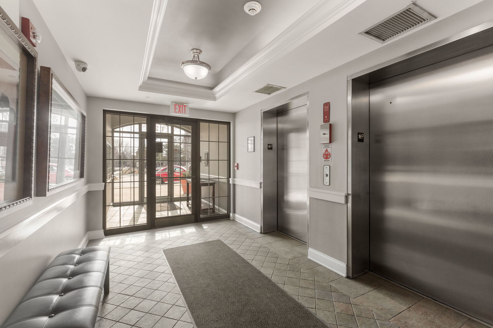125 North Buffalo Grove Road, Unit 104 Buffalo Grove, IL 60089 - Photo 16 of 17 a bathroom with a tub and shower