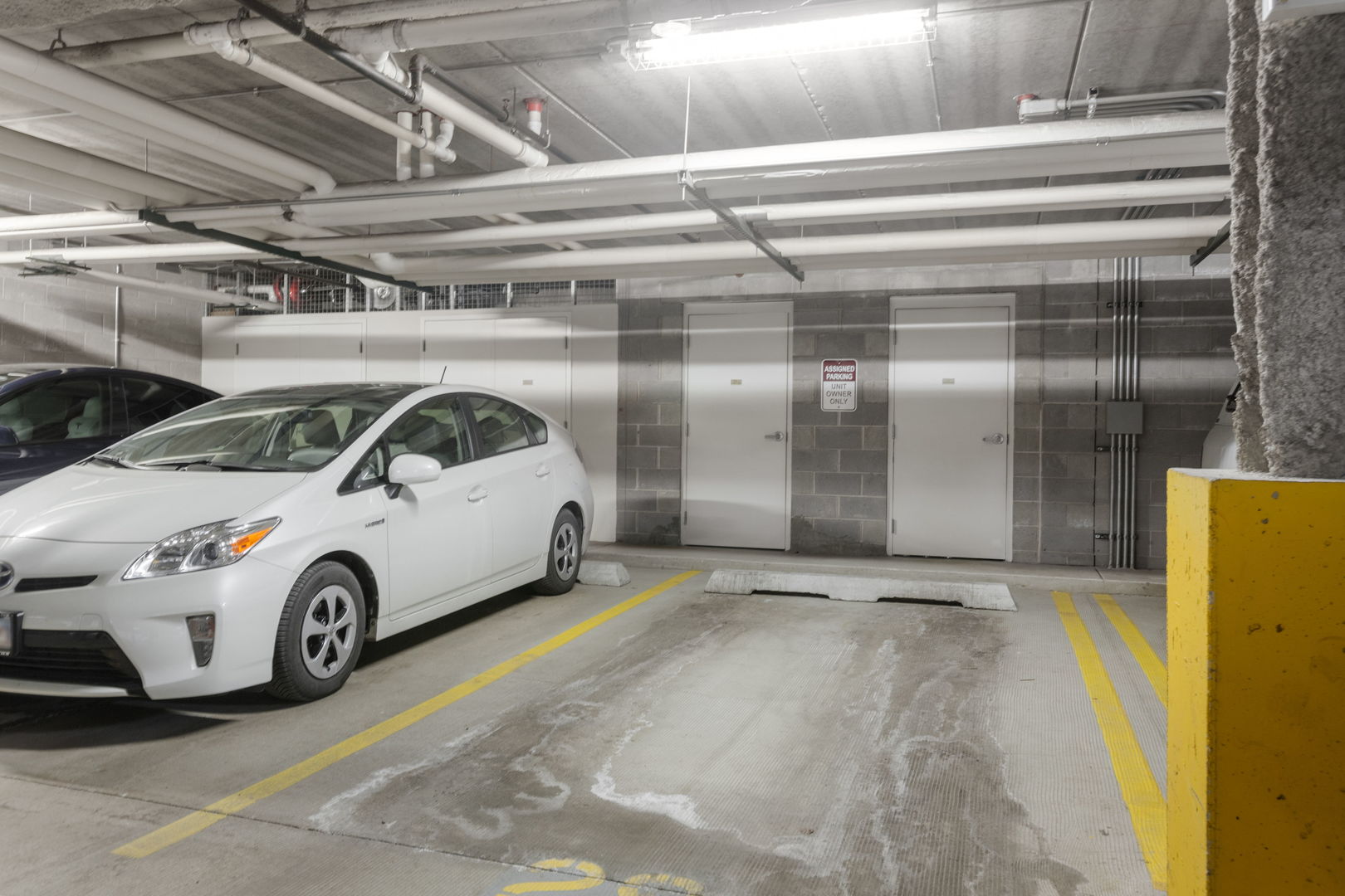 125 North Buffalo Grove Road, Unit 104 Buffalo Grove, IL 60089 - Photo 17 of 17 a view of parking garage with cars