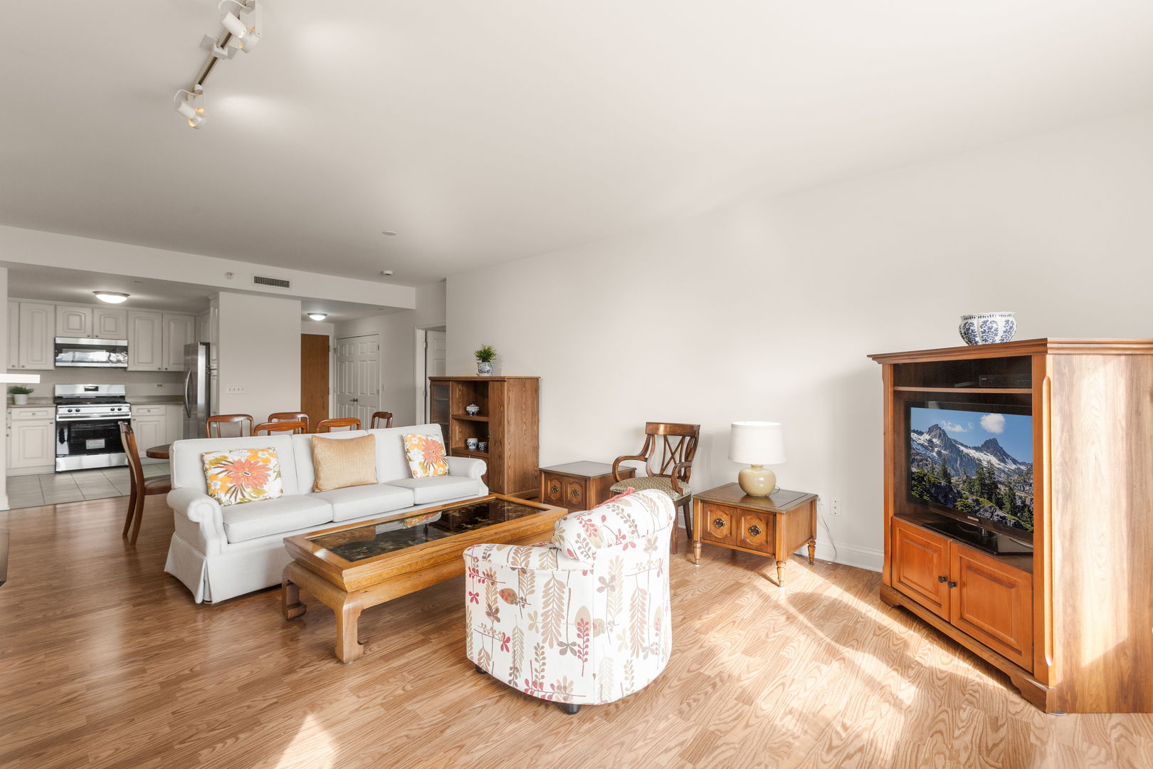 125 North Buffalo Grove Road, Unit 104 Buffalo Grove, IL 60089 - Photo 5 of 17 a living room with furniture and a fireplace