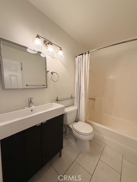 2500 East 4th Street, Unit 203 Long Beach, CA 90814 - Photo 20 of 35 a bathroom with a sink toilet and shower