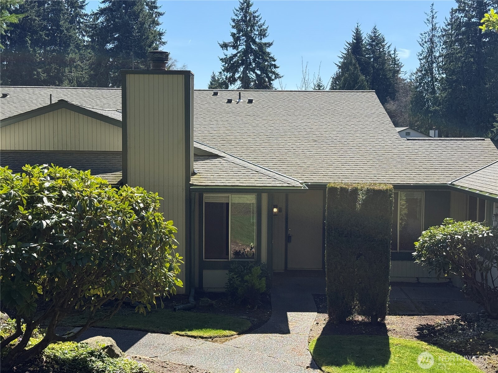 526 South 323rd Place, Unit 11F Federal Way, WA 98003 - Photo 1 of 24 a view of a house with a yard