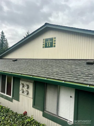 a front view of a house with garage