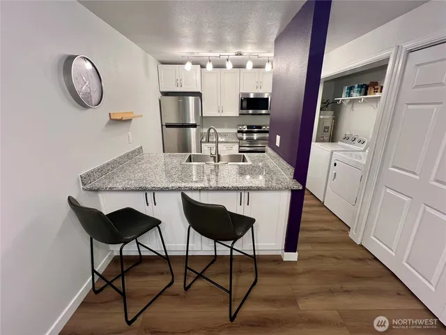 a view of dining table and chairs