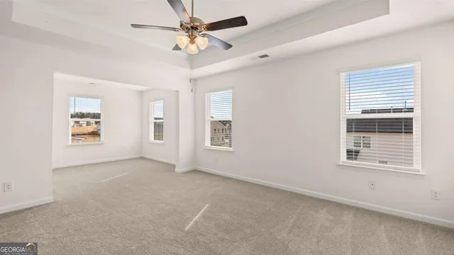 a bathroom with a bathtub shower and toilet