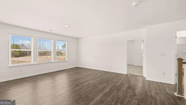 a view of a swimming pool with a table and chairs
