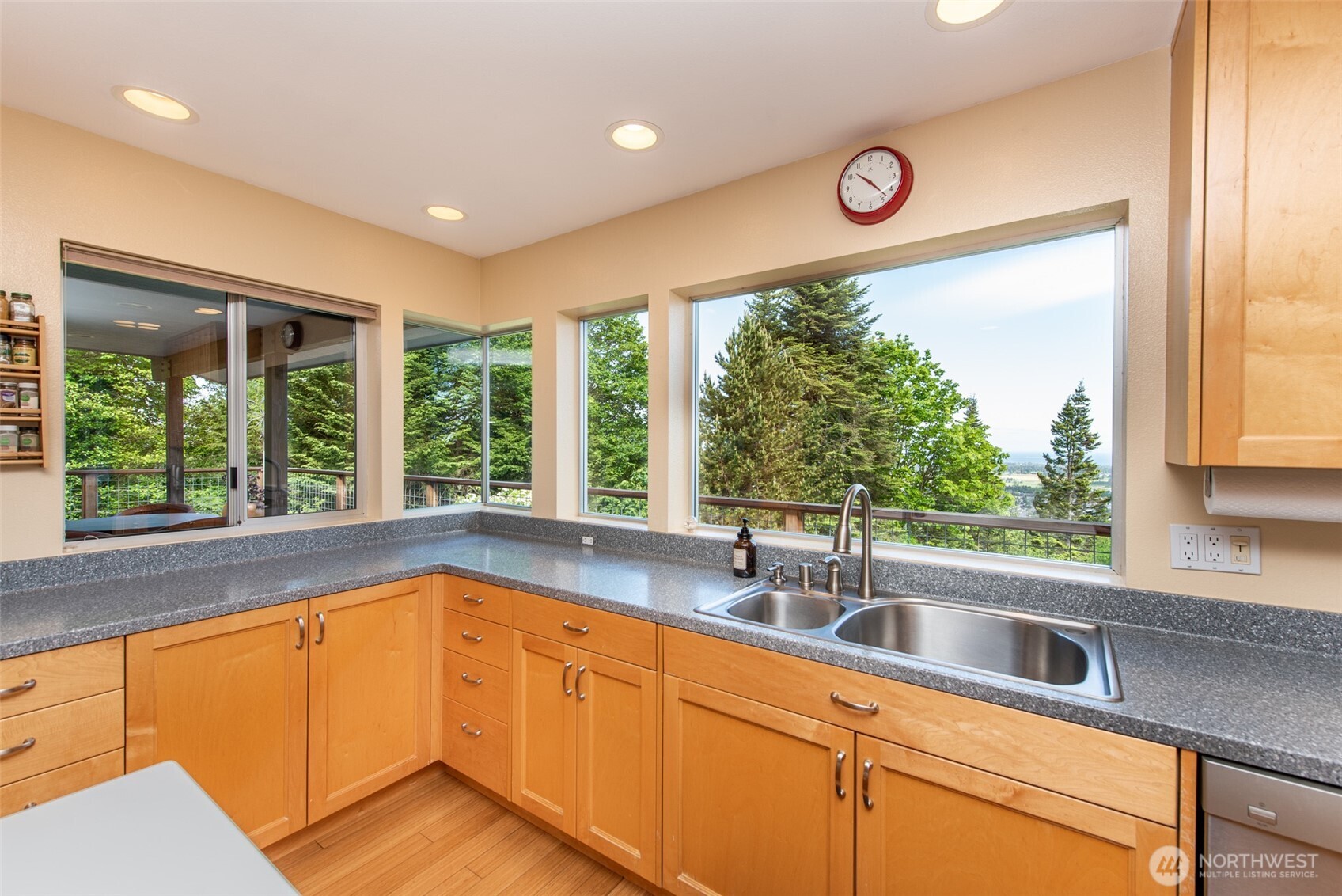 322 Ravens Ridge Road Sequim, WA 98382 - Photo 12 of 40 a kitchen with a sink and large window