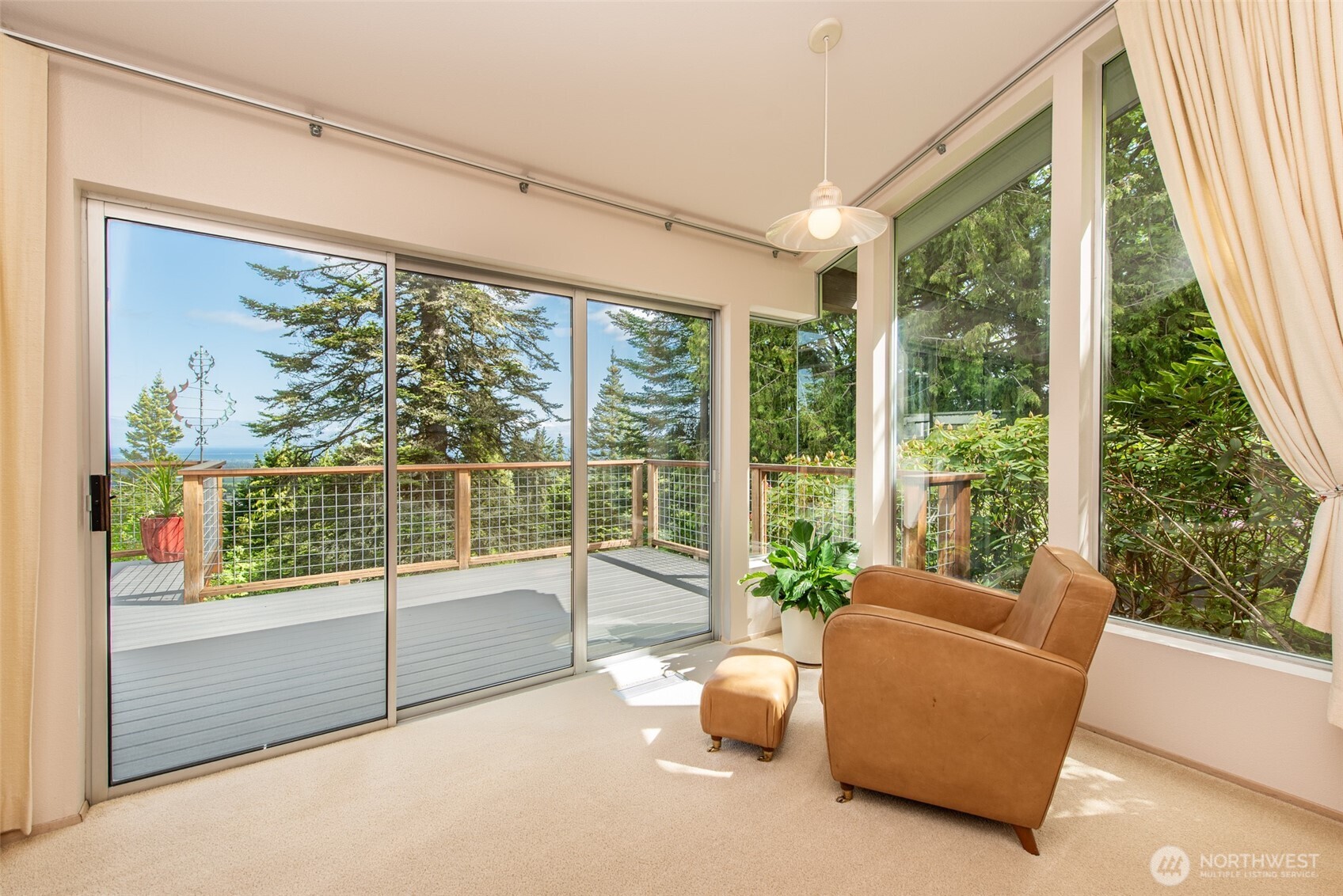 322 Ravens Ridge Road Sequim, WA 98382 - Photo 16 of 40 a living room with furniture and a large window